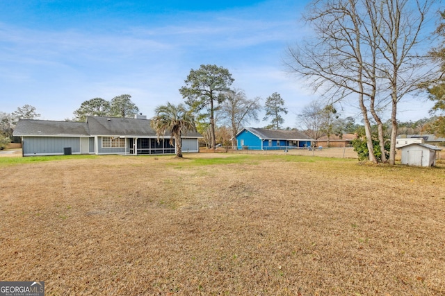 view of yard with a storage shed