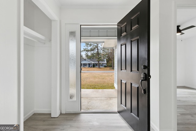 entryway featuring light hardwood / wood-style floors and ceiling fan