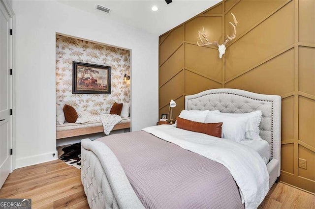 bedroom featuring hardwood / wood-style flooring