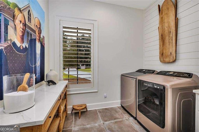 washroom with washing machine and dryer