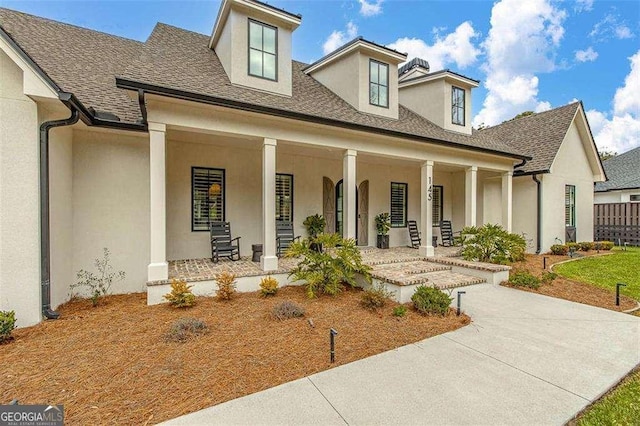 view of front of home featuring covered porch