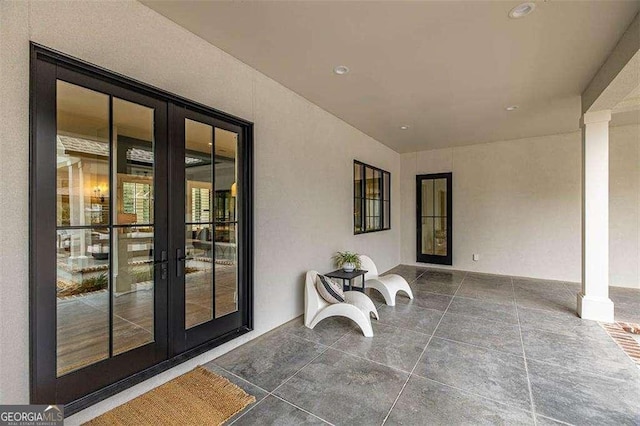 view of patio featuring french doors