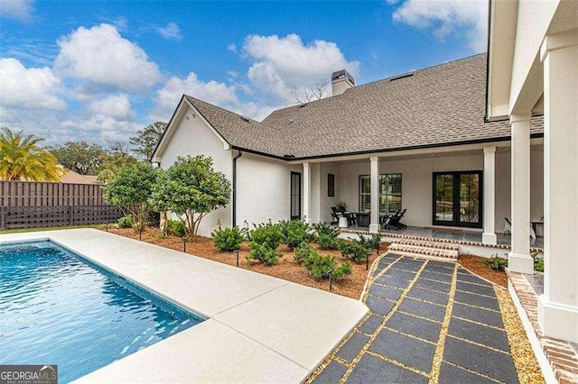 view of swimming pool featuring a patio