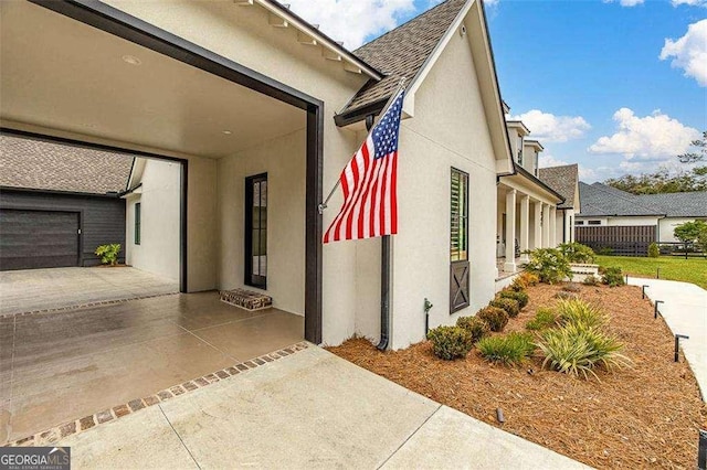 view of property exterior featuring a patio