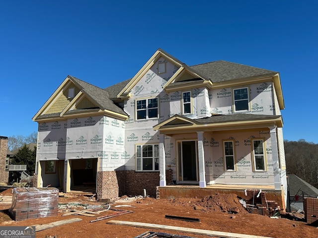 property under construction featuring a porch