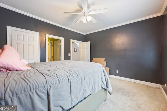 bedroom featuring crown molding, ceiling fan, and carpet