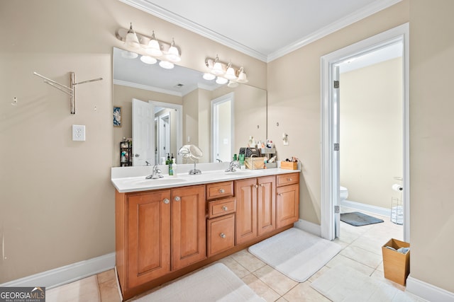 bathroom with tile patterned flooring, vanity, ornamental molding, and toilet