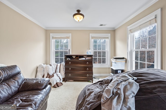 carpeted bedroom with ornamental molding