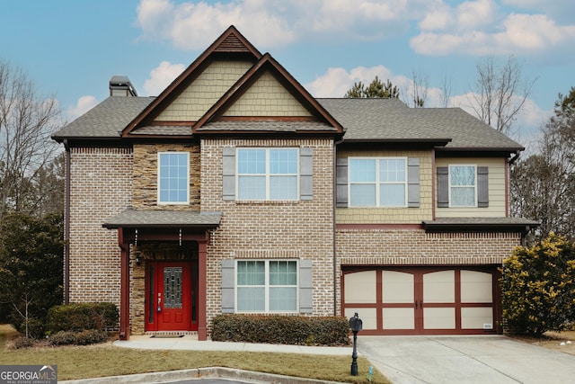 view of front of property with a garage