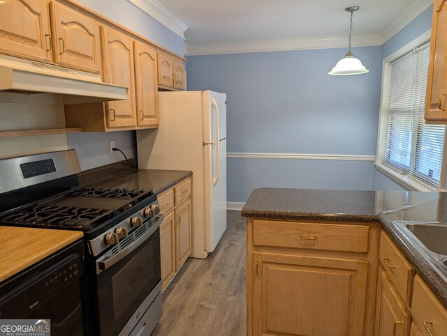 kitchen featuring stainless steel range with gas cooktop, under cabinet range hood, black dishwasher, dark countertops, and crown molding