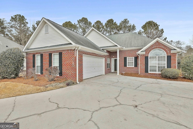 view of front of property with a garage