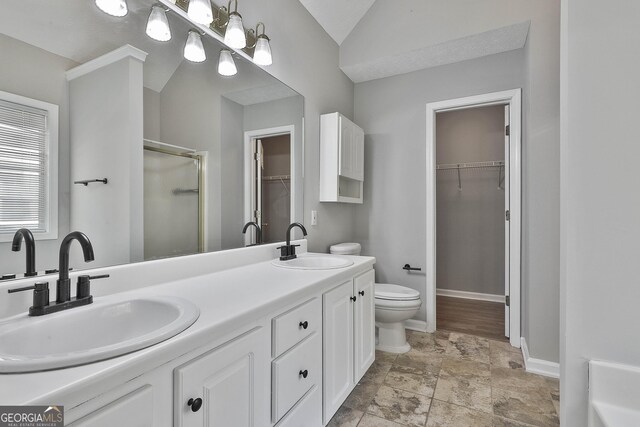 kitchen featuring white cabinetry, appliances with stainless steel finishes, sink, and pendant lighting