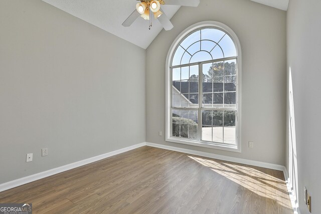 unfurnished dining area featuring a notable chandelier and dark wood-type flooring