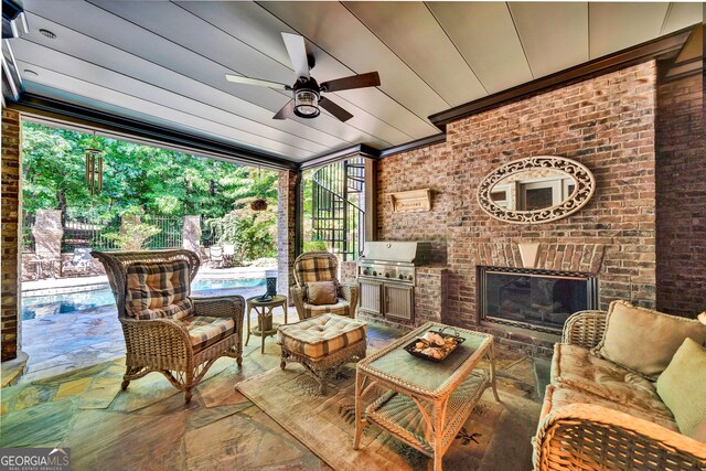 view of patio / terrace with ceiling fan and a grill