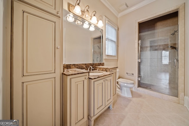 bathroom with vanity, toilet, a shower with door, crown molding, and tile patterned floors