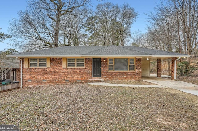 ranch-style home with a carport