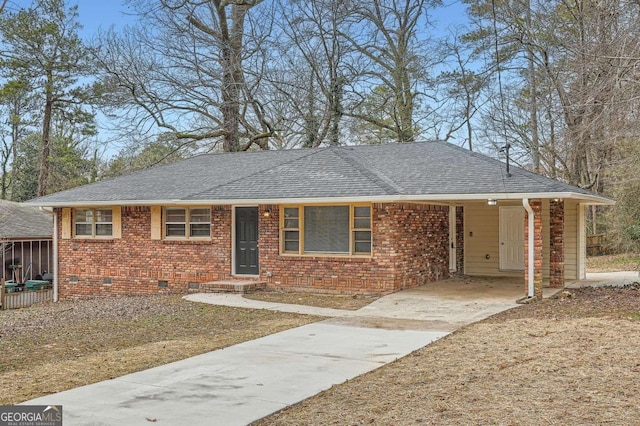 view of front of home featuring a carport