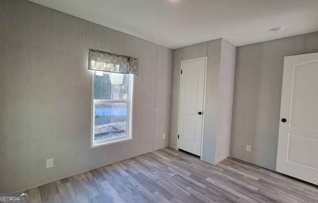 unfurnished bedroom featuring light hardwood / wood-style flooring