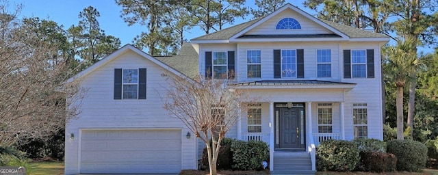 view of front of house with a garage