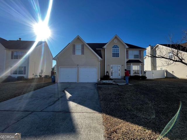 front of property with a garage