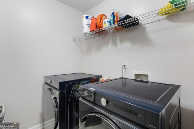 laundry room with washer and clothes dryer