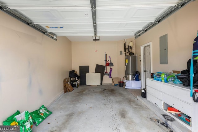 garage featuring electric panel and electric water heater