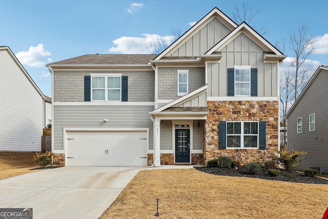 craftsman-style house featuring a garage, concrete driveway, stone siding, a front lawn, and board and batten siding