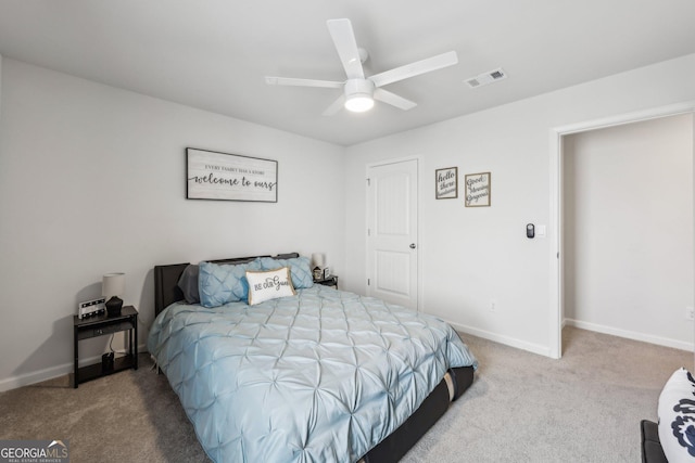 carpeted bedroom with ceiling fan