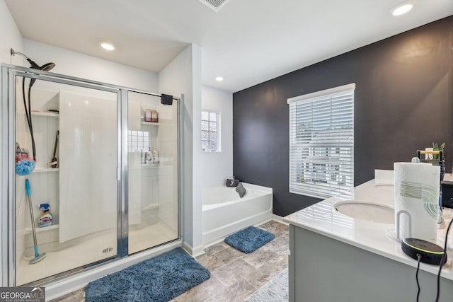 bathroom with vanity and plus walk in shower