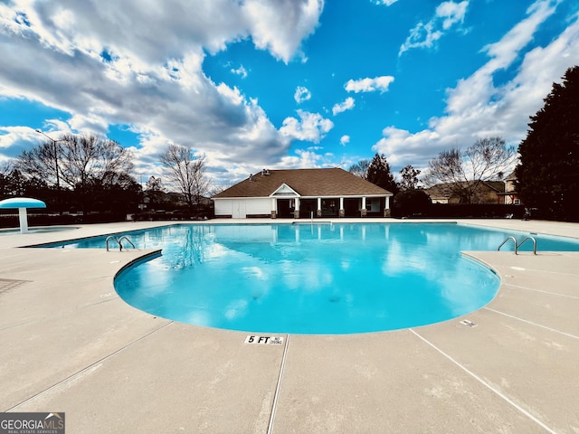 view of pool with a patio