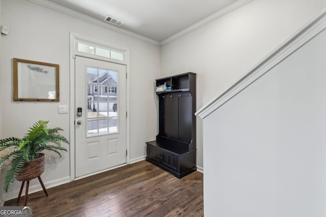 foyer with crown molding and dark wood-type flooring