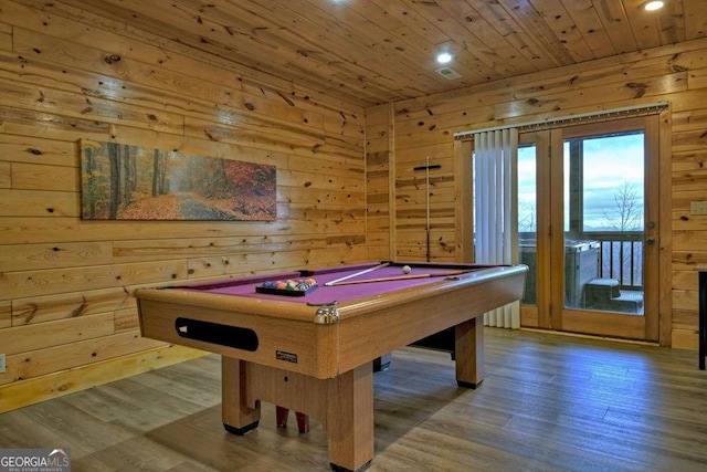 game room with hardwood / wood-style flooring, wooden ceiling, wooden walls, and billiards