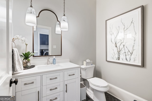 bathroom with vanity and toilet