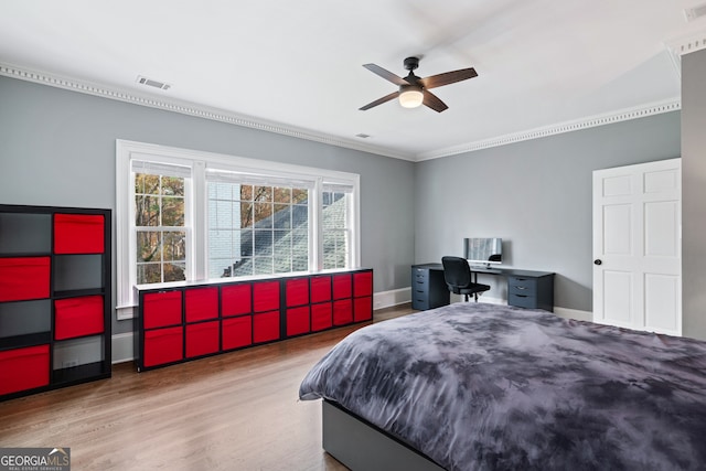 bedroom with ceiling fan and wood-type flooring