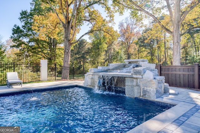 view of pool featuring pool water feature