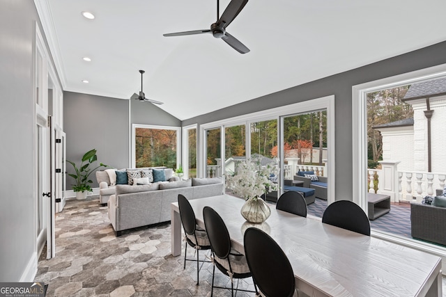 sunroom with vaulted ceiling and ceiling fan