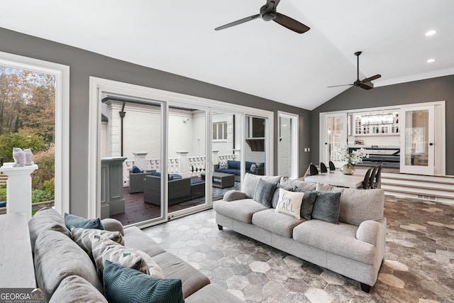 living room featuring lofted ceiling and ceiling fan