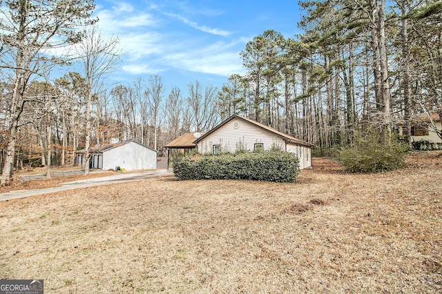 view of property exterior featuring a yard