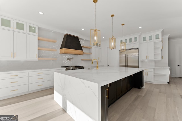 1041 Fleeman Rd, Hoschton, GA 30548 - kitchen featuring open shelves, stainless steel built in refrigerator, custom exhaust hood, decorative backsplash, and recessed lighting