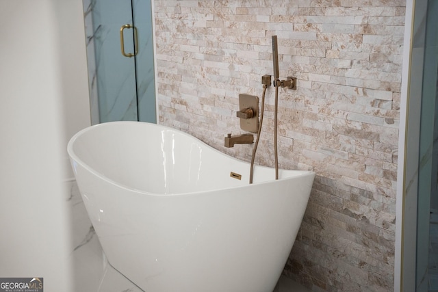 1041 Fleeman Rd, Hoschton, GA 30548 - full bathroom featuring a freestanding tub and a shower stall