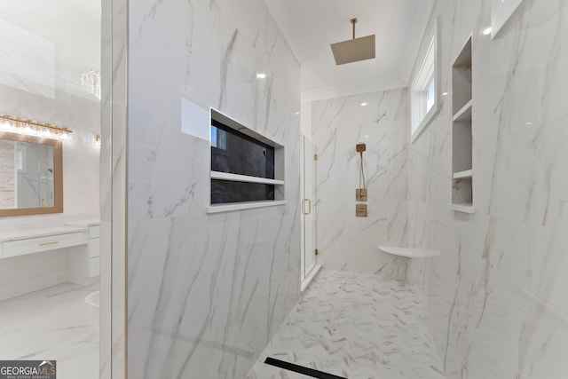 bathroom featuring vanity and a shower with door