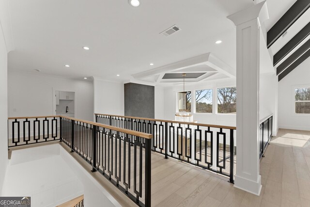 1041 Fleeman Rd, Hoschton, GA 30548 - corridor with an upstairs landing, light wood-type flooring, recessed lighting, and a chandelier