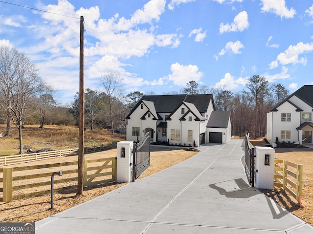 view of front of property with a garage