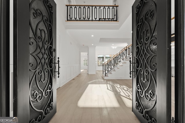 foyer with light wood-type flooring