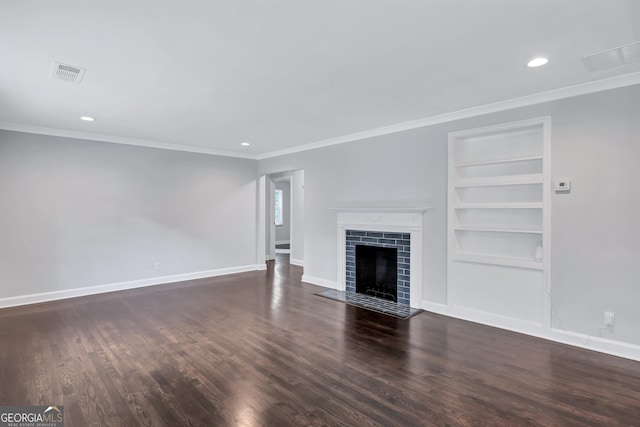 unfurnished living room with ornamental molding, built in features, and dark hardwood / wood-style floors