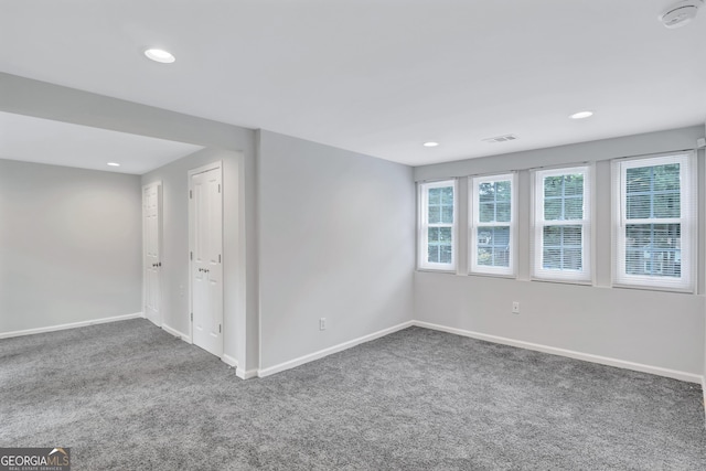 empty room featuring carpet floors