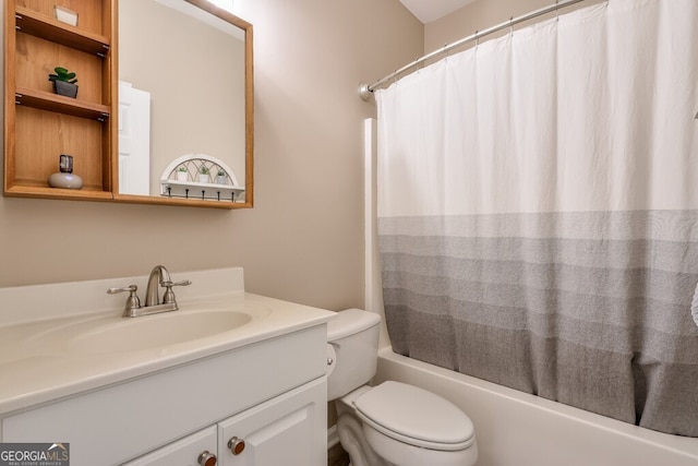 full bathroom with vanity, shower / bath combination with curtain, and toilet