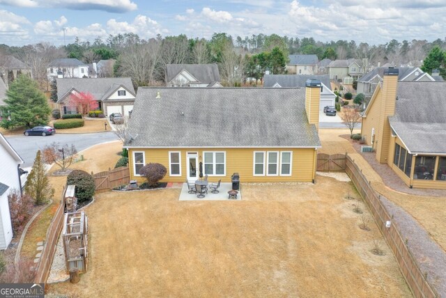 rear view of property with a patio area