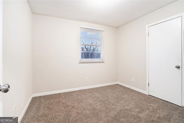 view of carpeted spare room