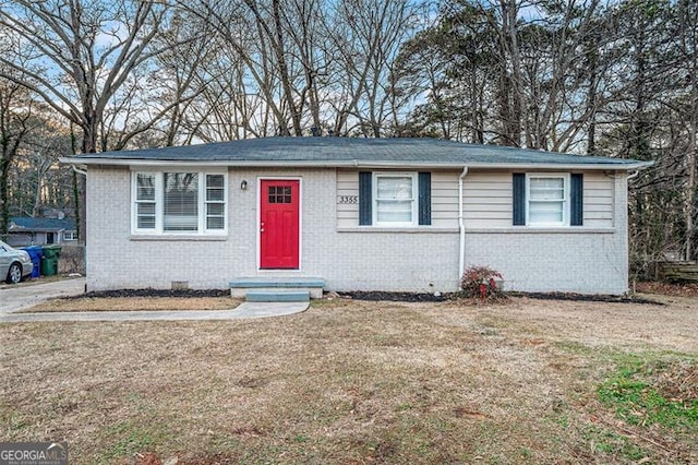 ranch-style house with a front yard